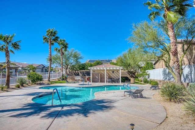 view of pool featuring a patio