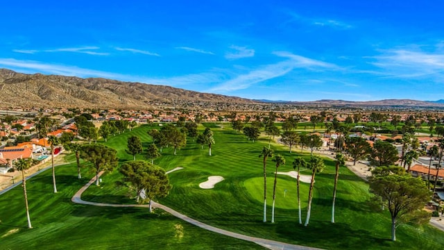 surrounding community with a mountain view