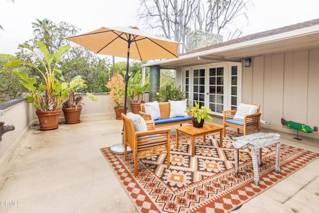 view of patio with french doors and an outdoor living space