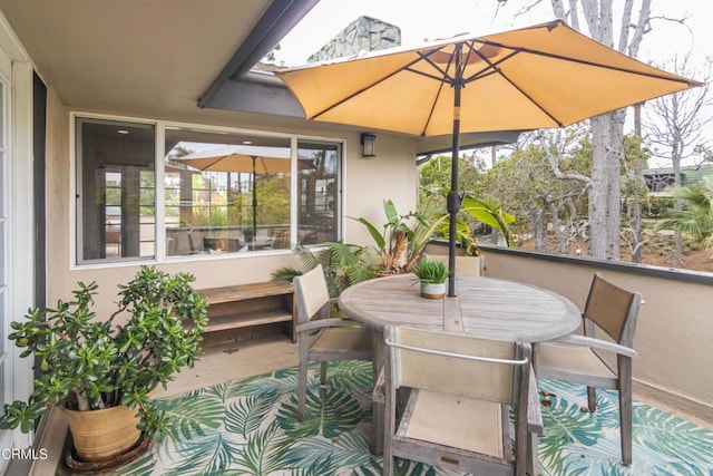 exterior space with outdoor dining area