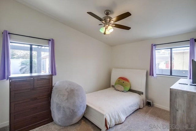 carpeted bedroom with ceiling fan