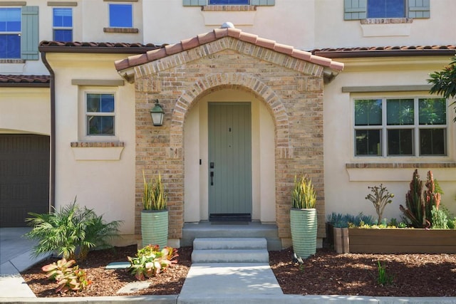 entrance to property featuring a garage