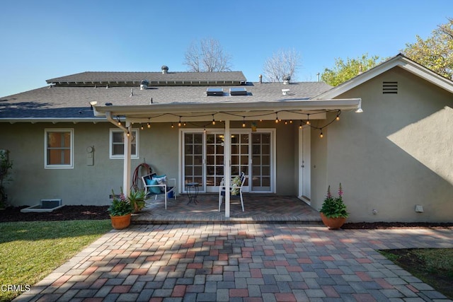 rear view of house with a patio area