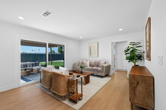 living room featuring light wood-type flooring