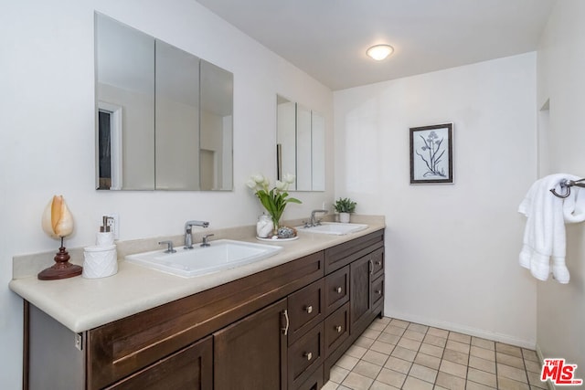 bathroom featuring vanity and tile patterned floors