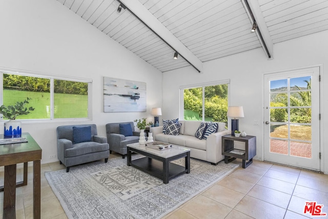 tiled living room featuring beamed ceiling, rail lighting, wooden ceiling, and high vaulted ceiling