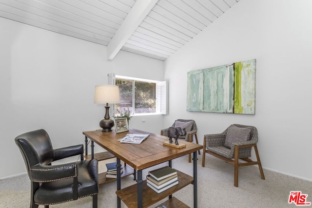 home office with lofted ceiling with beams and carpet floors