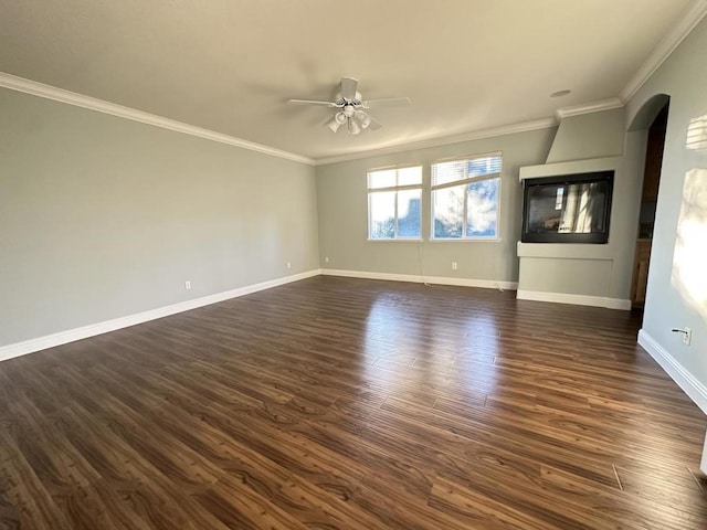 interior space featuring dark hardwood / wood-style flooring, crown molding, and ceiling fan