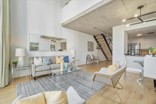 living room with light hardwood / wood-style floors