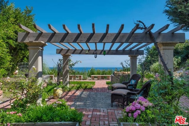 view of patio featuring a pergola