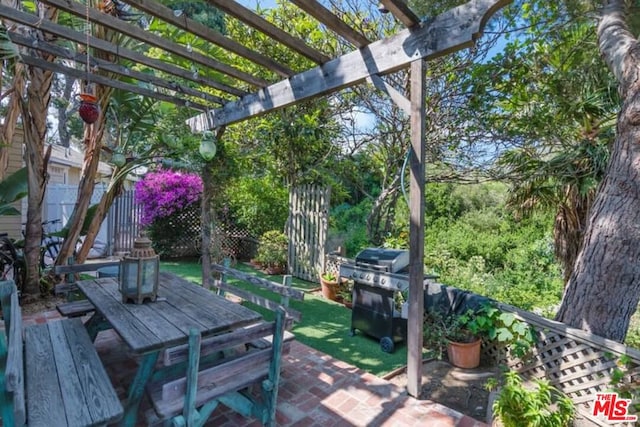 view of patio featuring a pergola