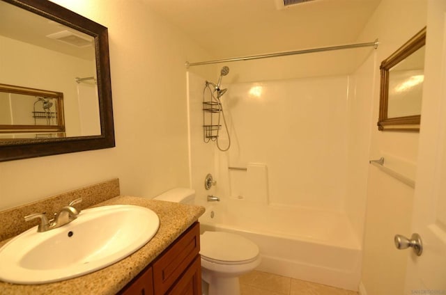 full bathroom featuring vanity, bathtub / shower combination, tile patterned floors, and toilet