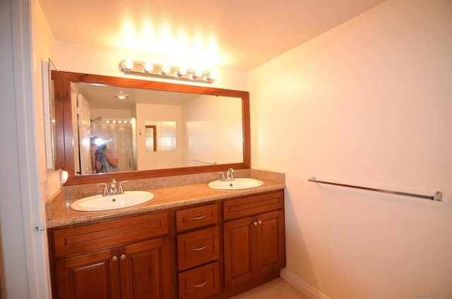 bathroom featuring vanity and tile patterned floors