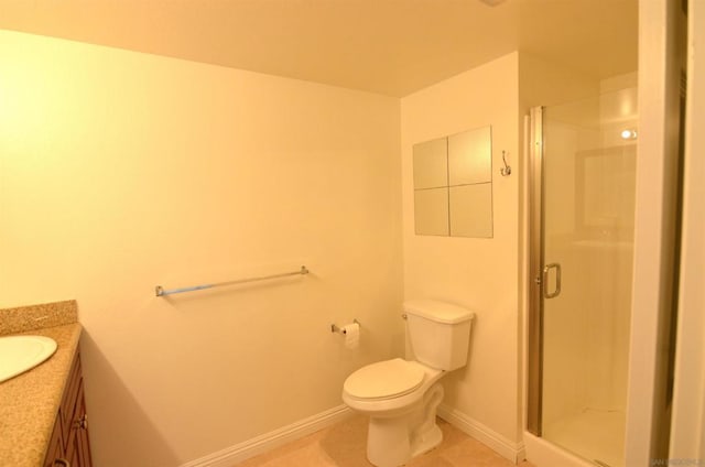 bathroom featuring walk in shower, tile patterned floors, toilet, and vanity