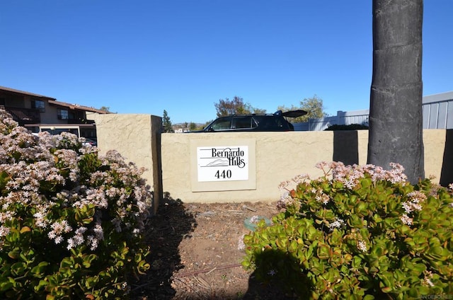 view of community sign