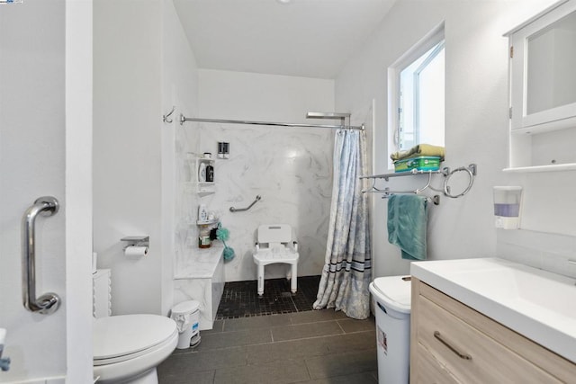 bathroom with vanity, a shower with curtain, and toilet