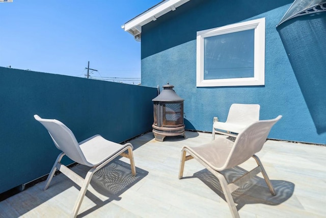 view of patio / terrace featuring a fire pit