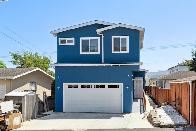 front of property featuring an outdoor structure