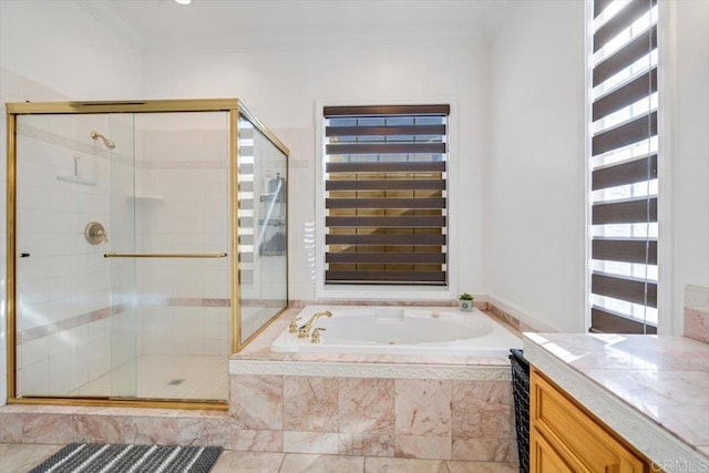 bathroom with ornamental molding, separate shower and tub, and a wealth of natural light