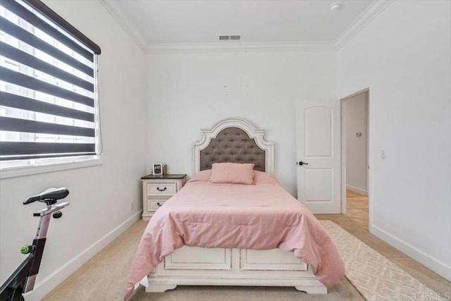 bedroom with multiple windows and ornamental molding