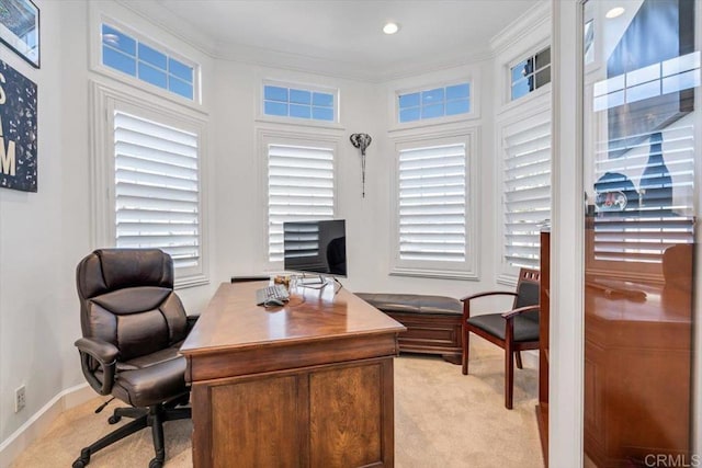 office area featuring ornamental molding and light carpet