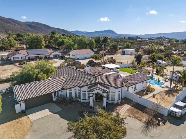 bird's eye view with a mountain view