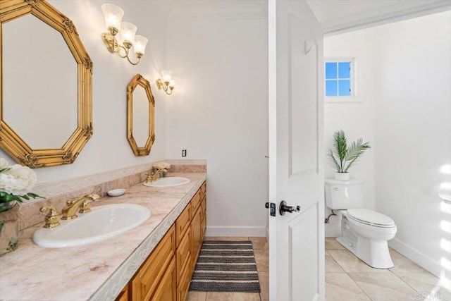 bathroom with vanity, tile patterned floors, and toilet