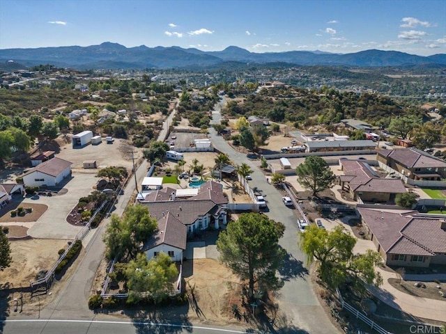 drone / aerial view featuring a mountain view