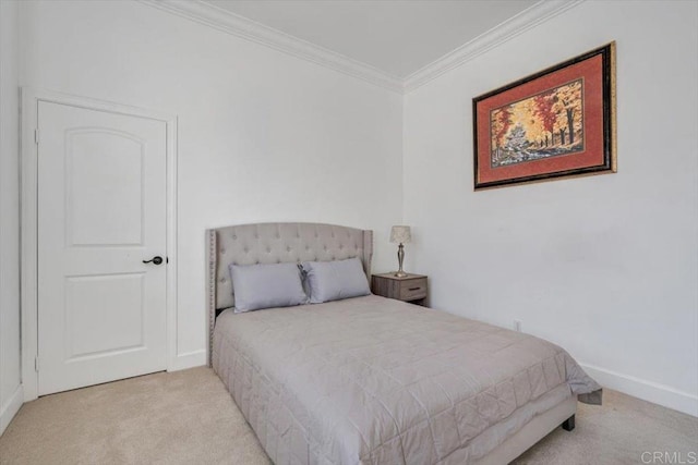 bedroom featuring light carpet and crown molding