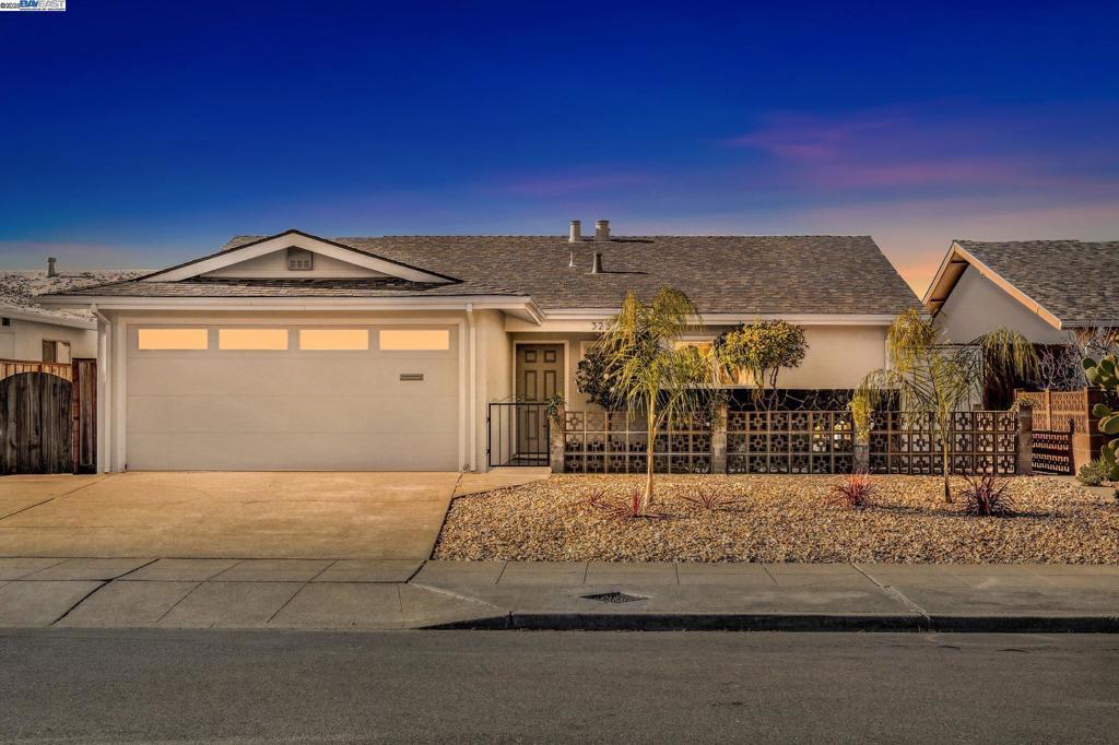 ranch-style home with a garage