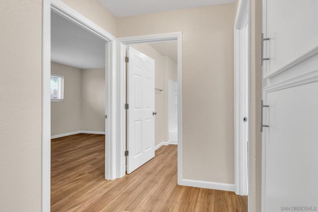 hallway featuring light hardwood / wood-style floors