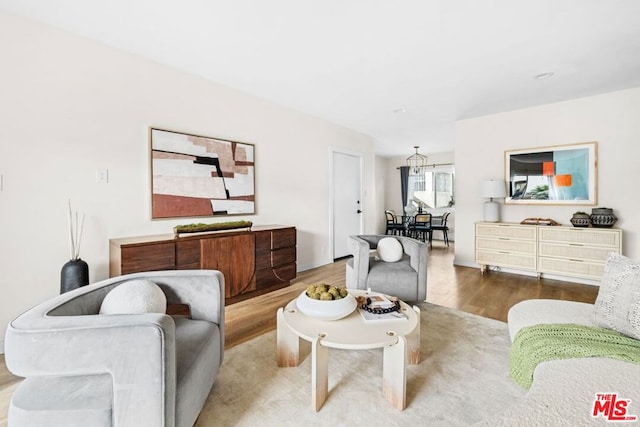 living room with light hardwood / wood-style flooring