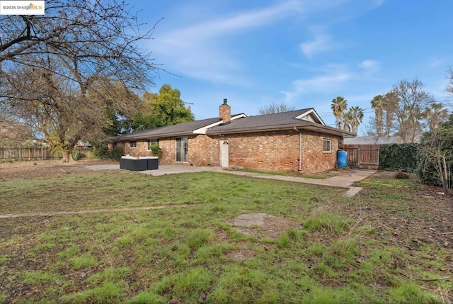 exterior space featuring a yard, an outdoor living space, and a patio