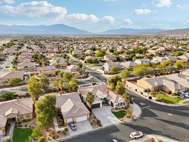 bird's eye view with a mountain view