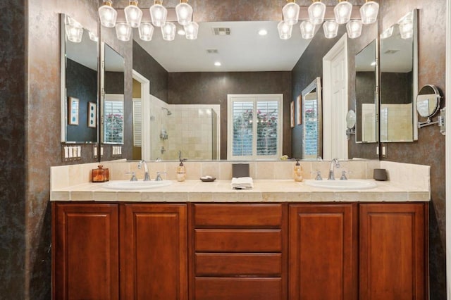 bathroom featuring vanity and a tile shower