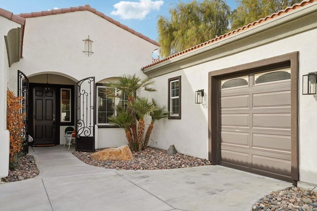 property entrance featuring a garage