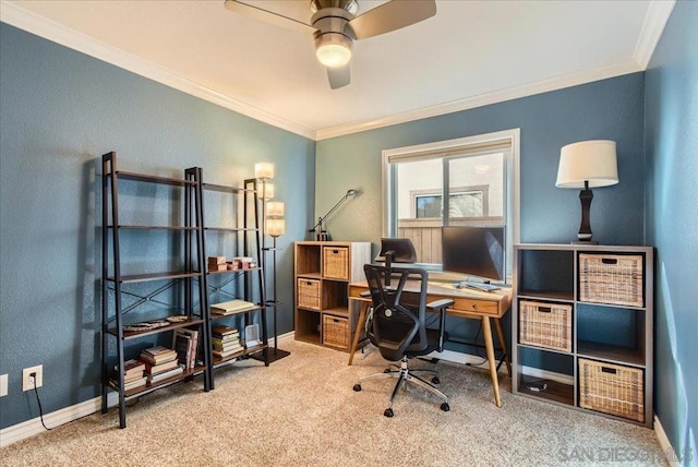 office space featuring ornamental molding, ceiling fan, and carpet