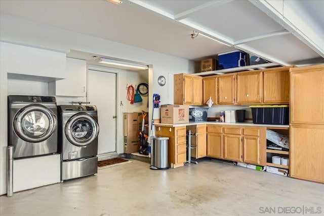 garage with independent washer and dryer