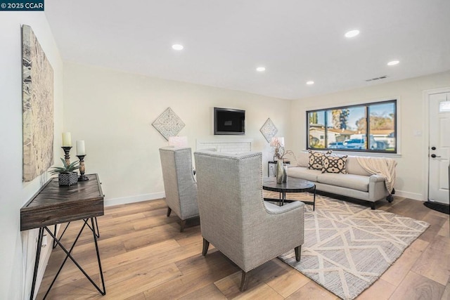 living room featuring light hardwood / wood-style flooring