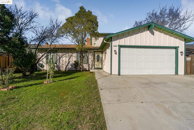 ranch-style house with a garage and a front yard