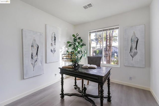 home office featuring dark hardwood / wood-style floors