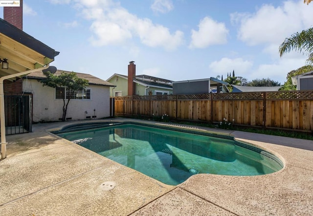 view of pool featuring a patio