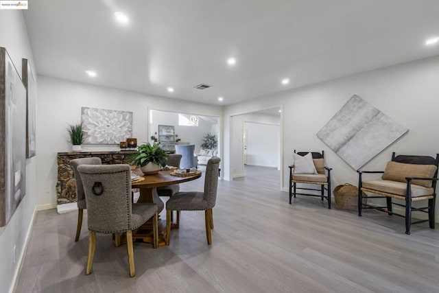 dining area featuring light hardwood / wood-style flooring