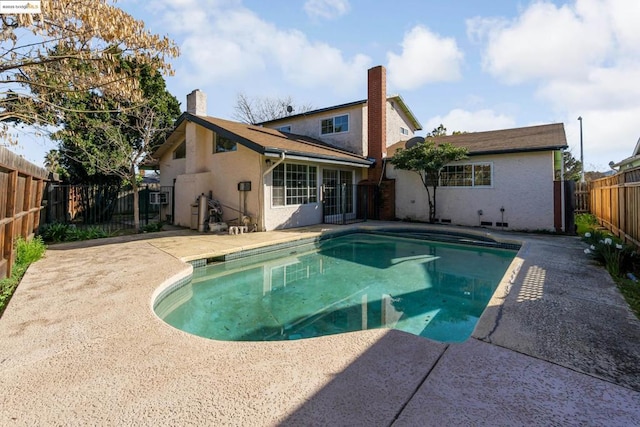 view of pool featuring a patio area