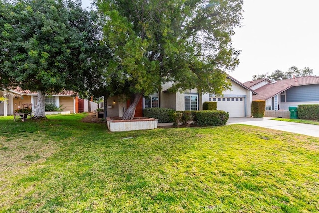 view of front facade featuring a garage, concrete driveway, a front yard, and stucco siding