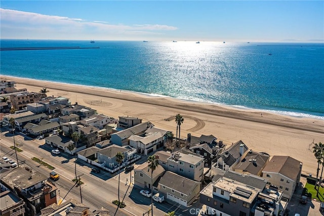 aerial view with a beach view and a water view