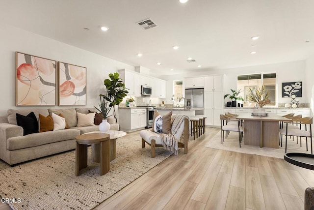 living room featuring light hardwood / wood-style floors