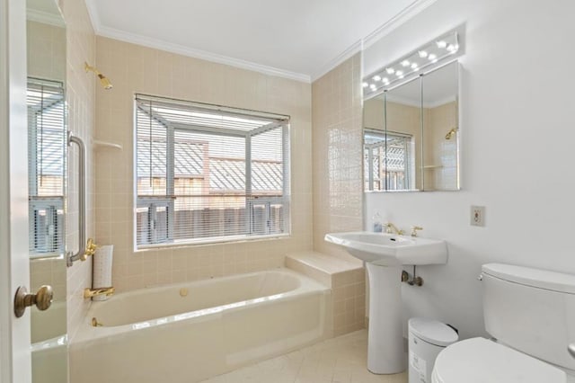 bathroom with tile patterned floors, ornamental molding, toilet, and a washtub