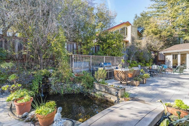 view of property's community with a patio area