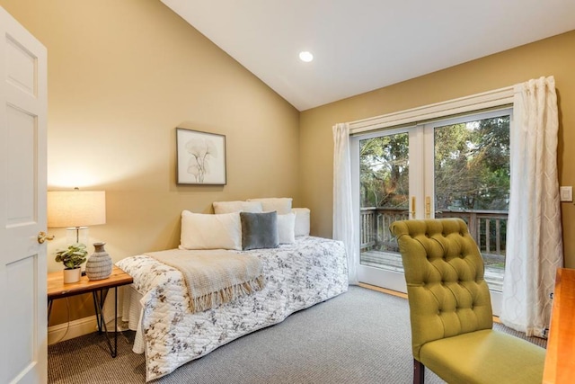 carpeted bedroom featuring lofted ceiling and access to outside